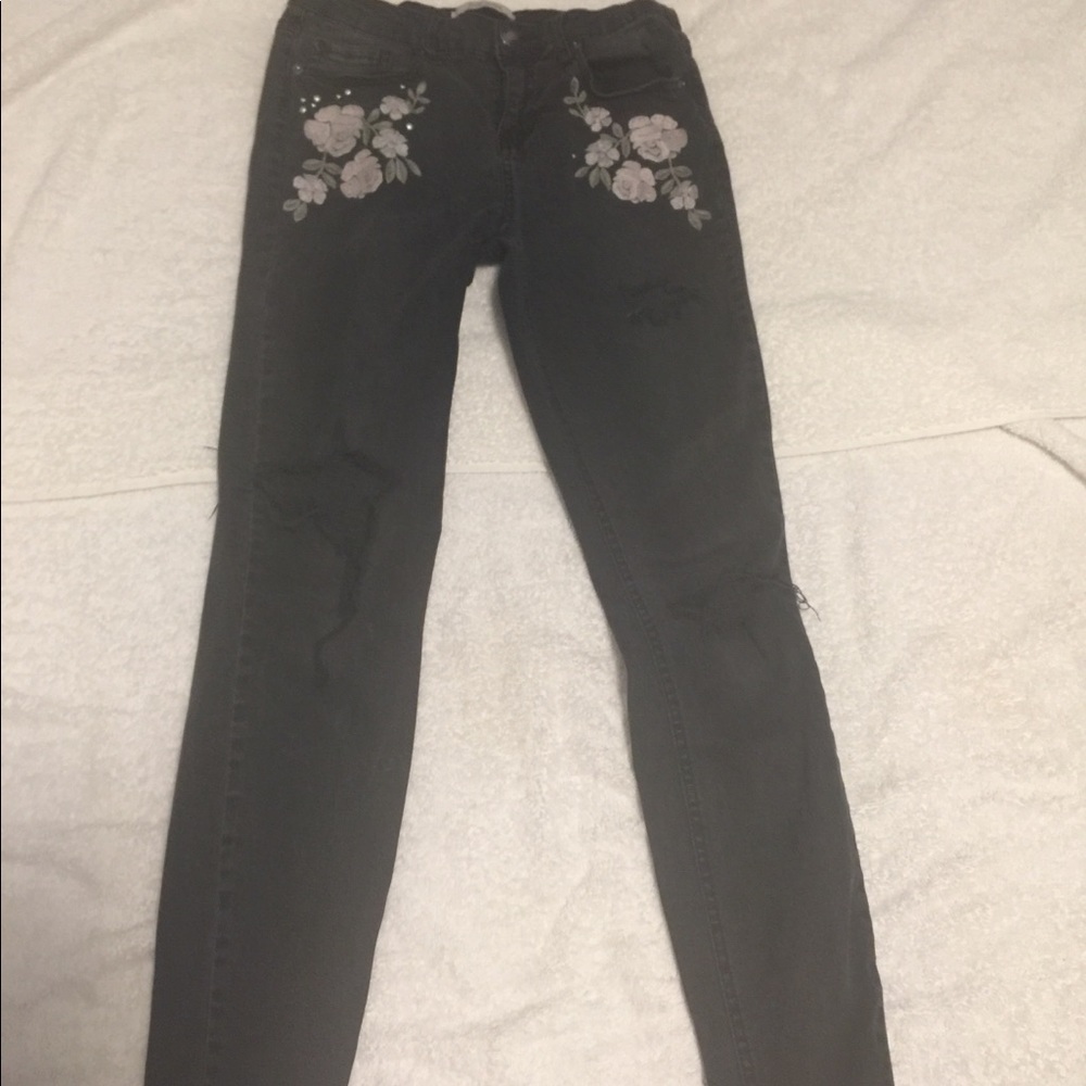 Adam Levine ripped jeans